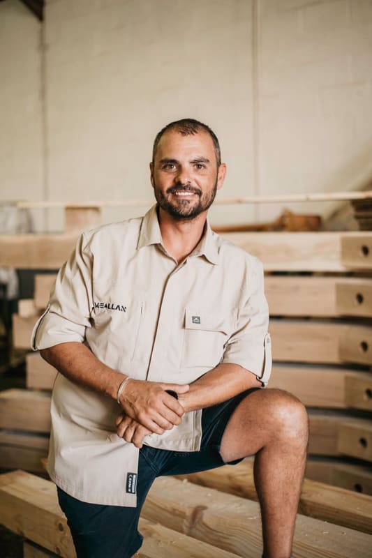 Edward Whelan of Spoednik Construction in a timber yard